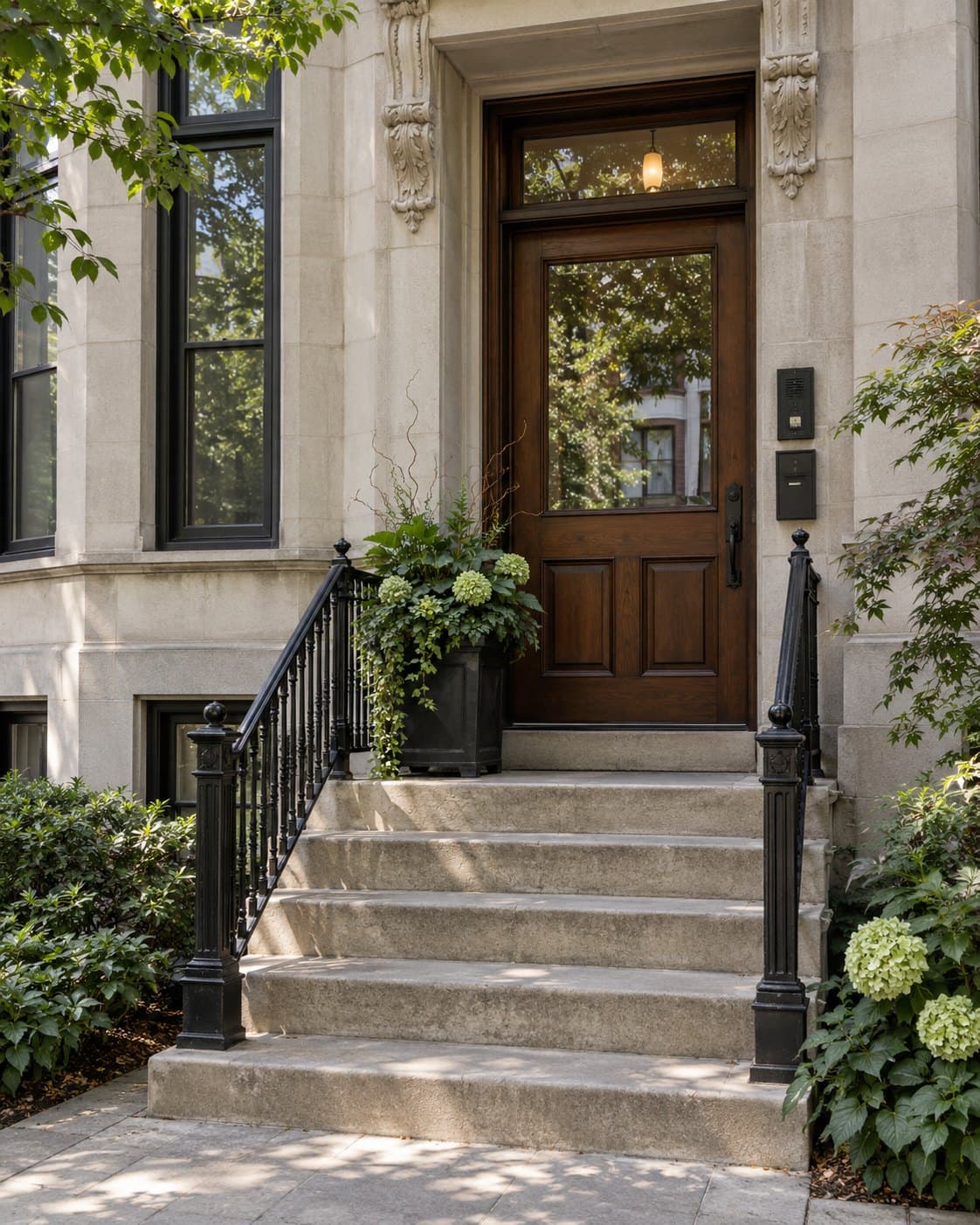 Building entrance with stone steps and a wooden door