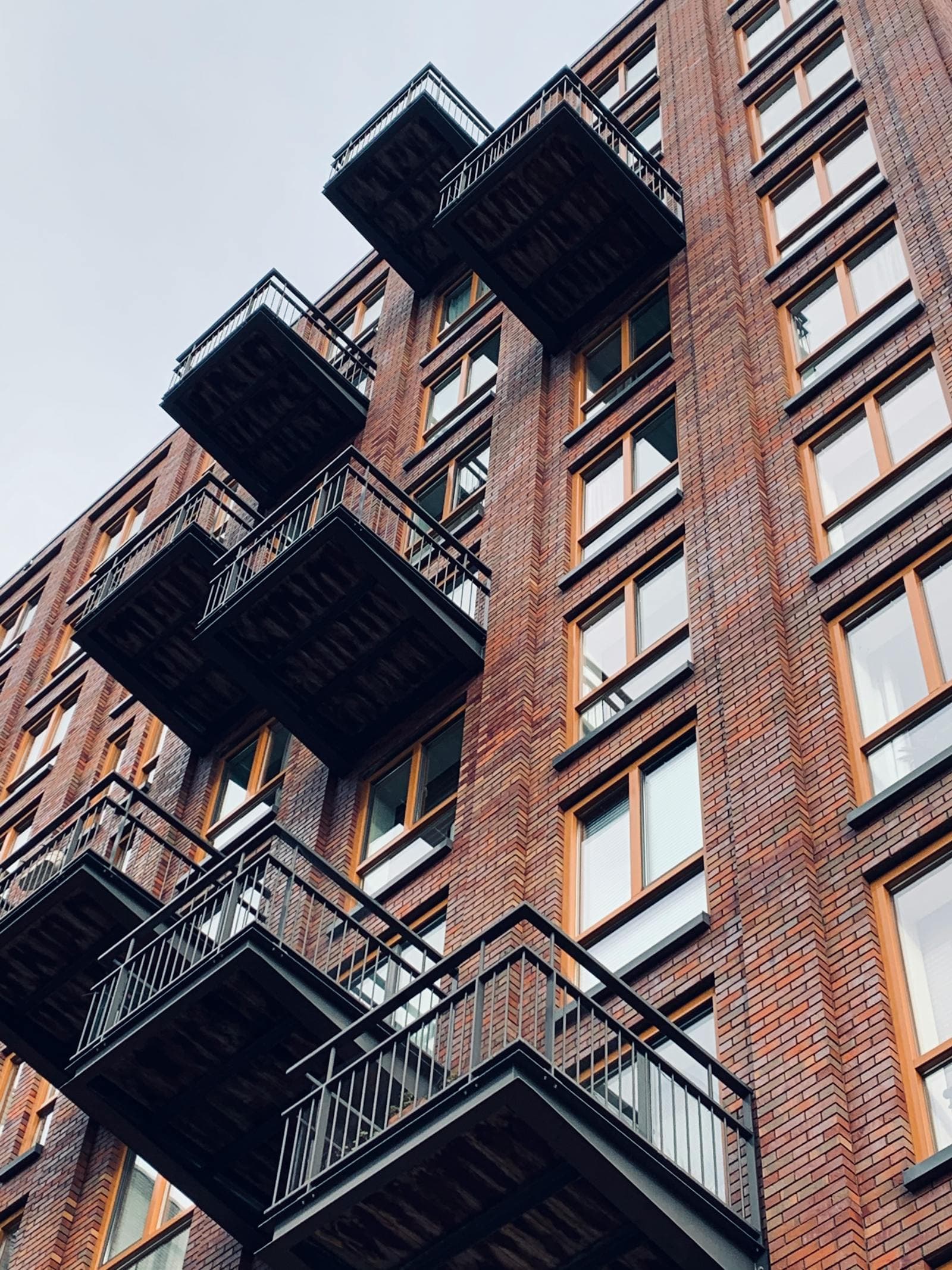 Brick apartment building with balconies